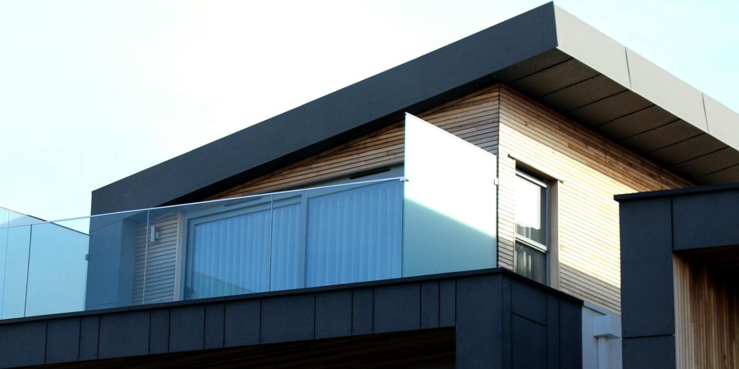 Contemporary building facade with sleek lines and glass elements in Poole, UK.